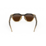 Vue arrière des lunettes Oakley Meta HSTN avec monture Light Curry et verres Transitions® marron.