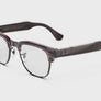 Orchidée transparente sur gris fusil avec verres Transitions® ruby